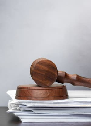 A judge’s gavel resting on legal documents